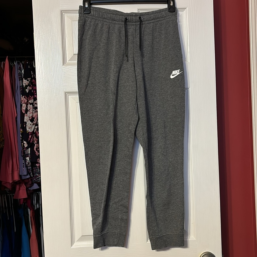 Nike grey sweat pants size medium no pockets has drawstring and elastic waist